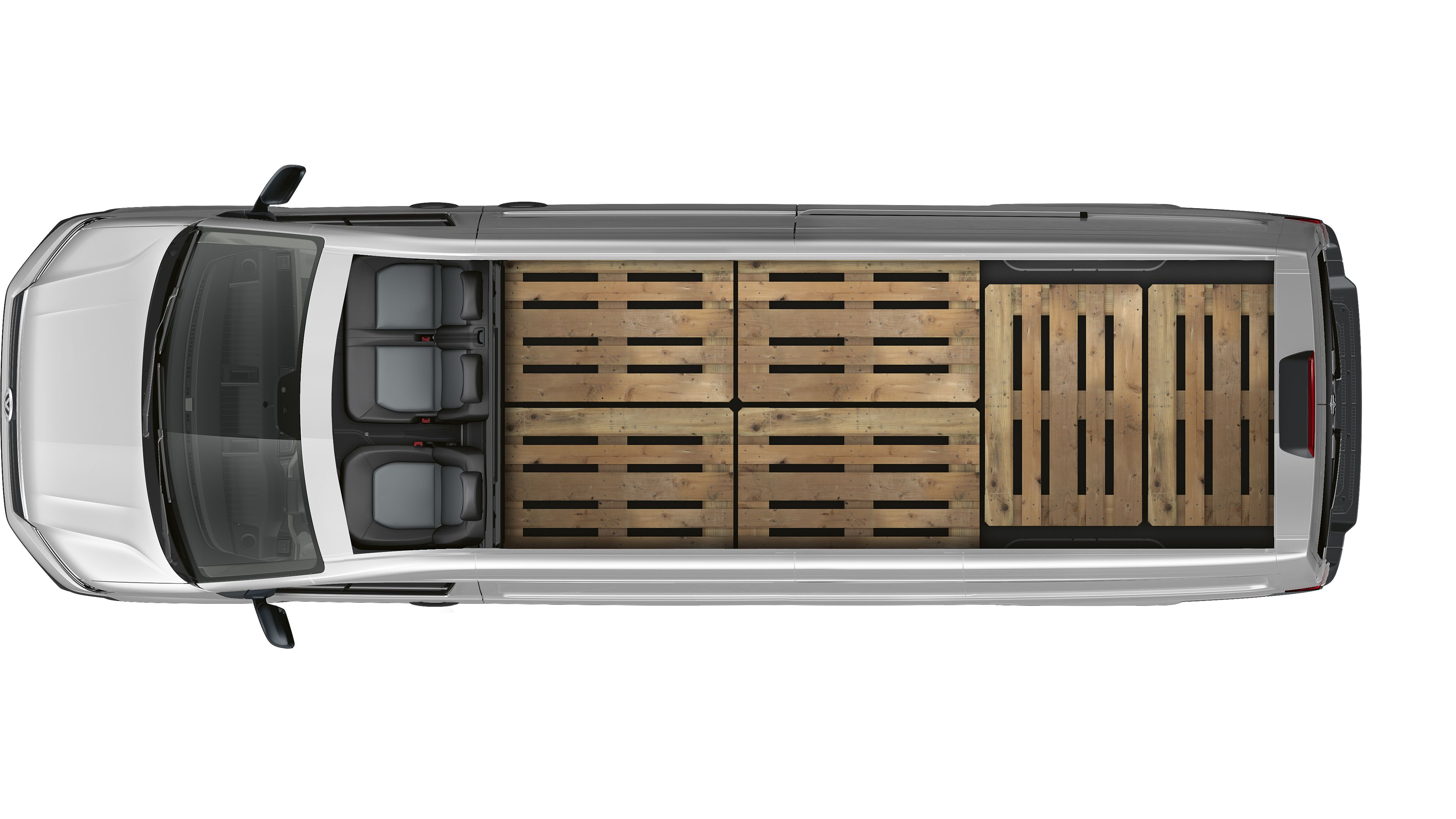 Изглед отгоре на Volkswagen Crafter с три седалки и максимално натоварено товарно отделение с палети.
