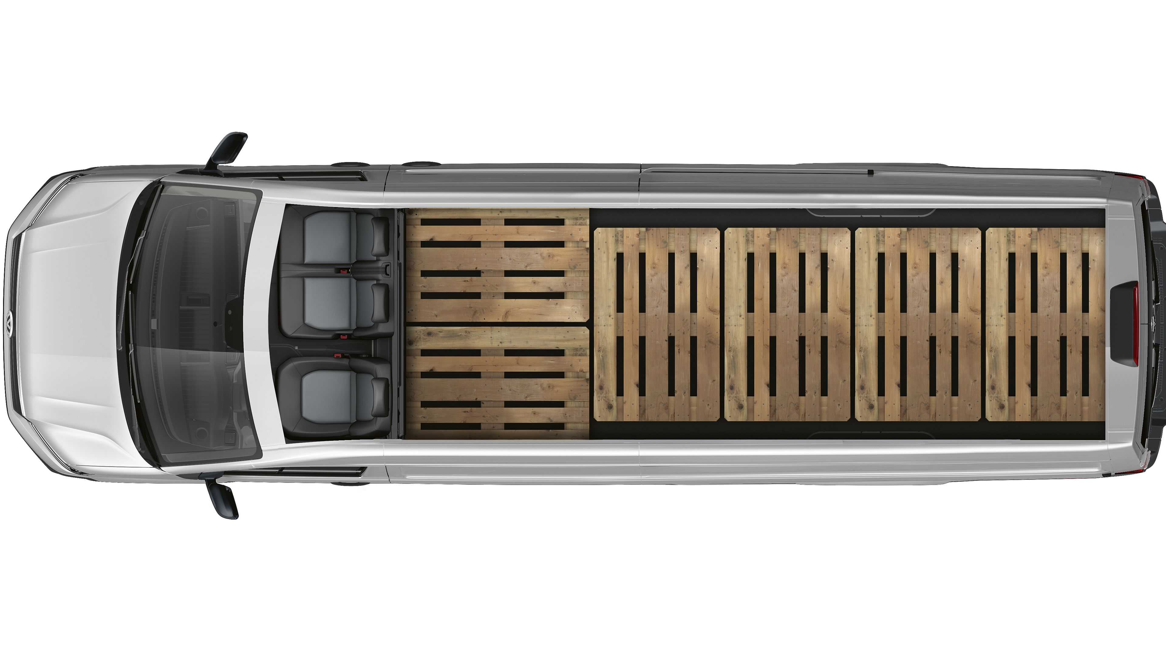 Изглед отгоре на Volkswagen Crafter с три седалки и изцяло натоварено товарно отделение с шест дървени палета.