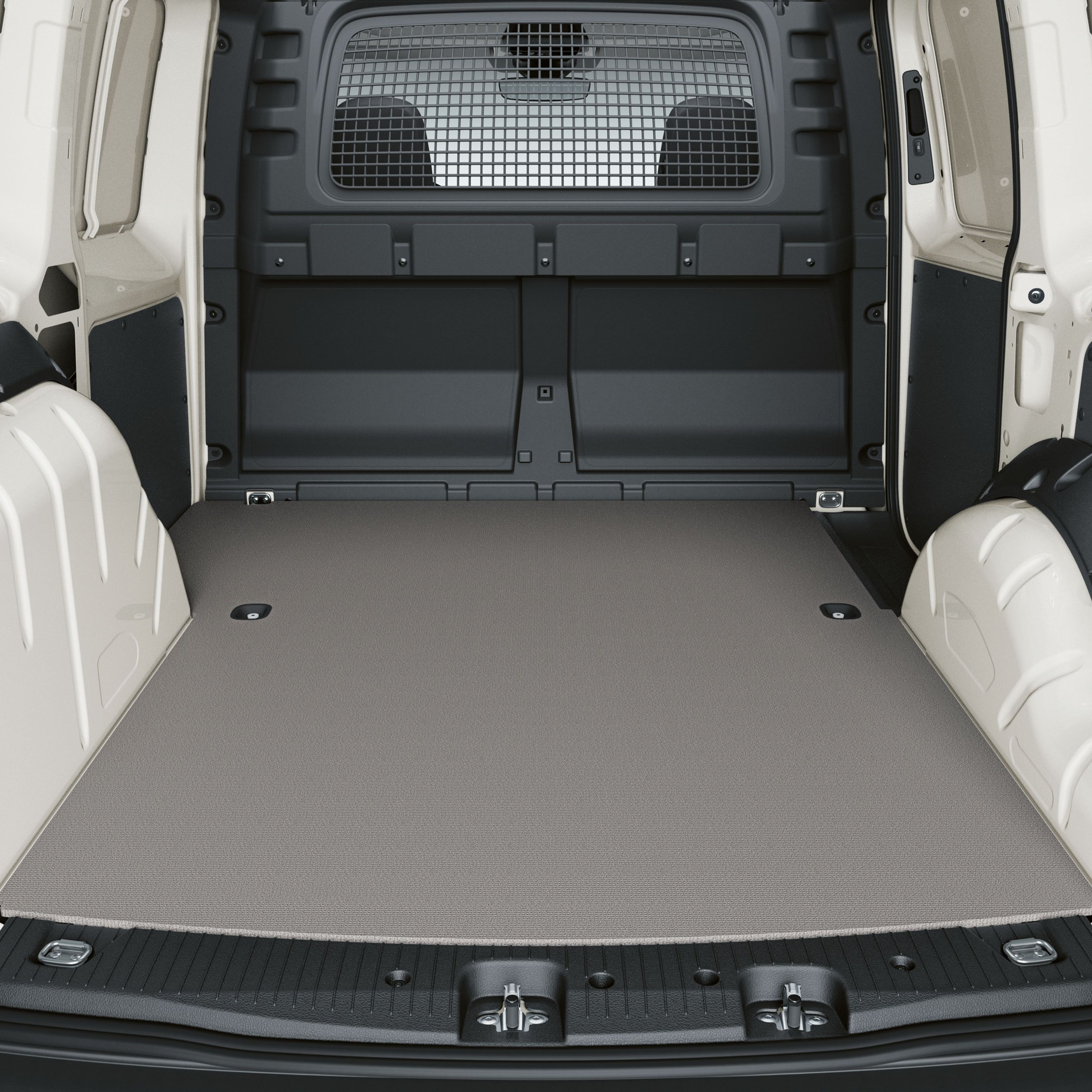 Подът в товарното отделение на бял VW Caddy Cargo.