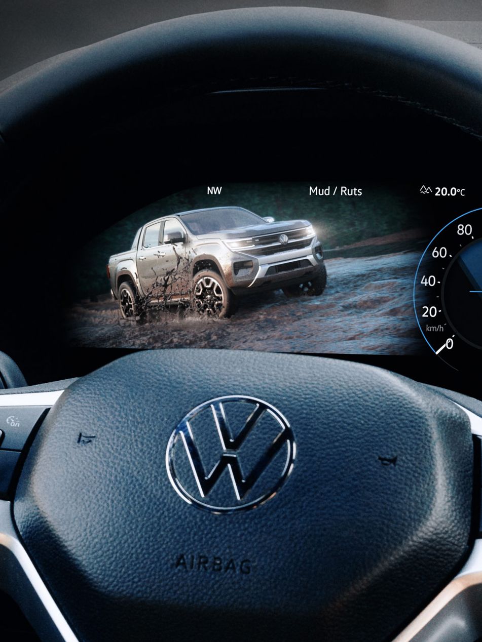 Цифров инструментален панел на Volkswagen с визуализация на офроуд режим и изображение на пикап Amarok